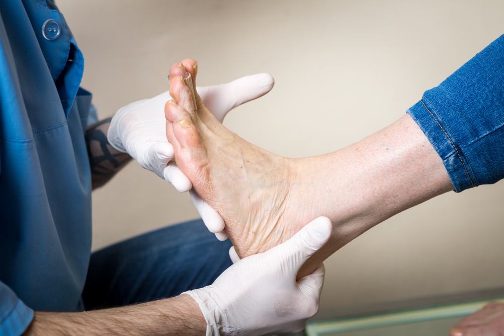 The,hands,of,a,young,man,doctor,orthopedist,conducts,diagnostics,