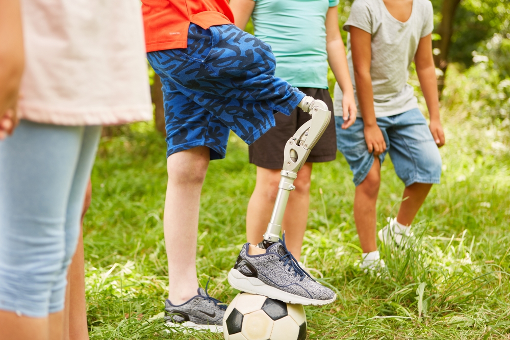 Group,of,children,playing,with,soccer,ball,with,boy,with